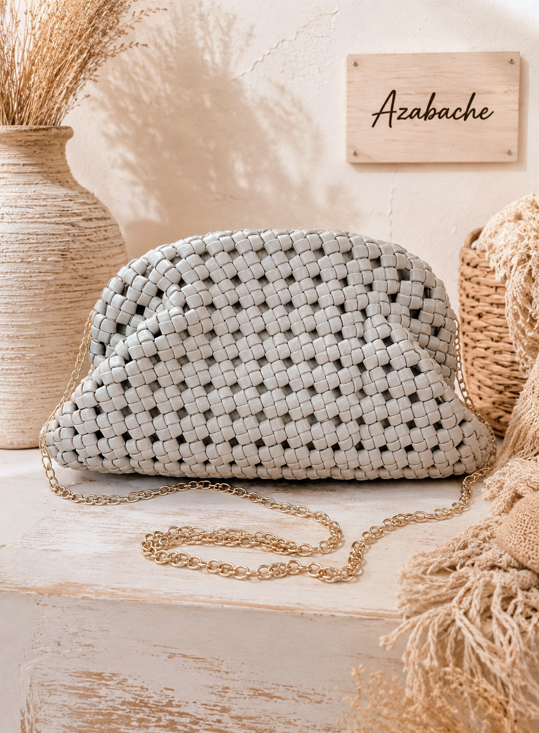 Bolso de polipiel trenzado con cadena bandolera